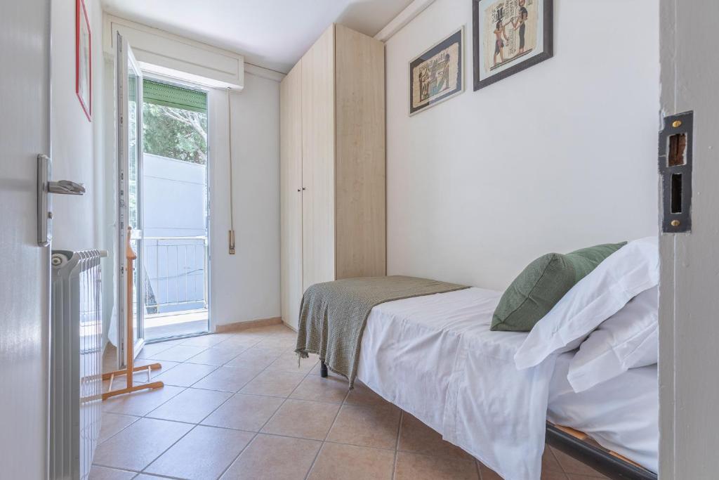 Postel nebo postele na pokoji v ubytování Lido Degli Estensi Flat con Balcone e Parcheggio!