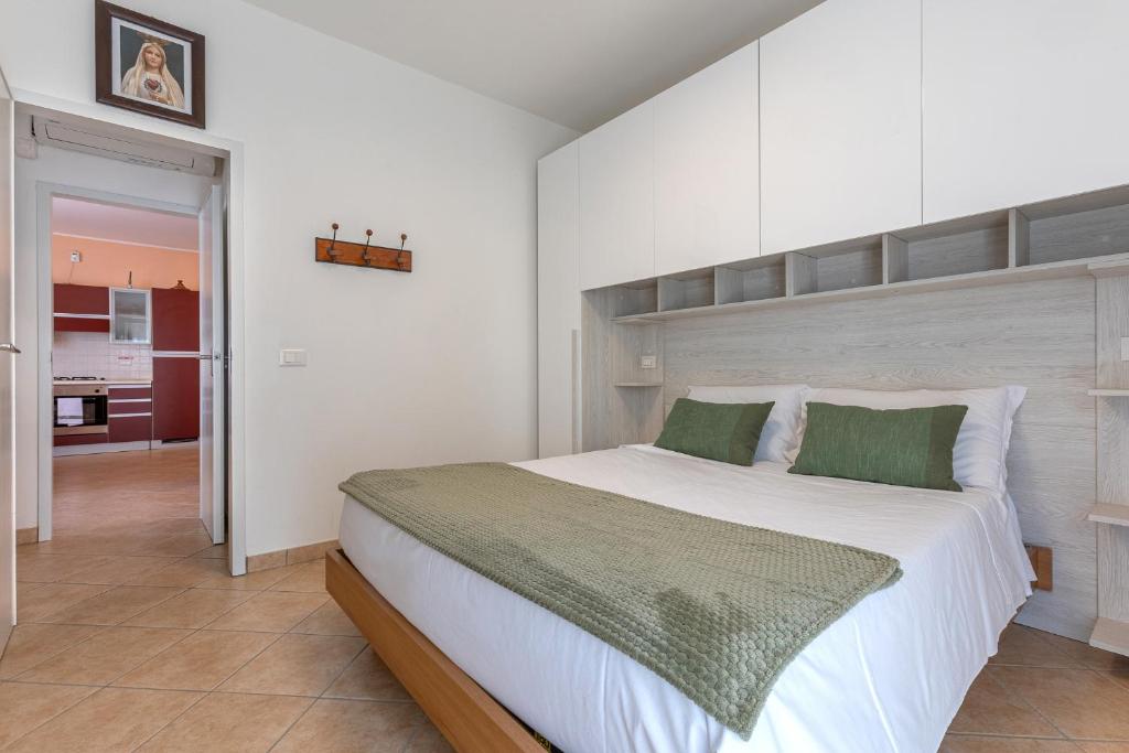 Postel nebo postele na pokoji v ubytování Lido Degli Estensi Flat con Balcone e Parcheggio!