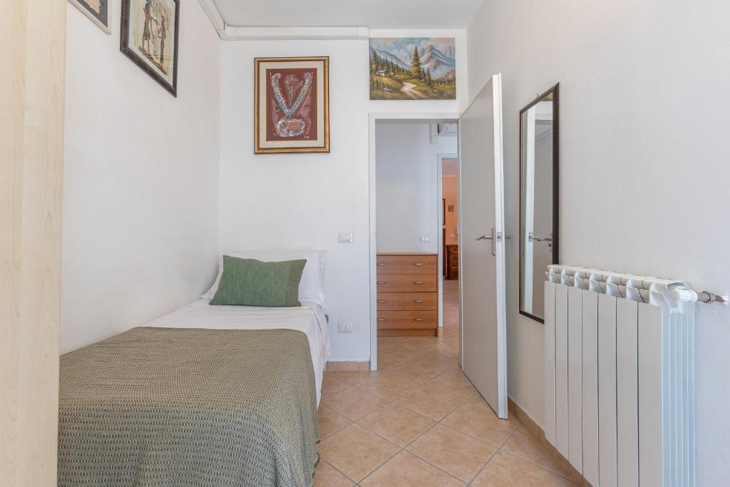 Postel nebo postele na pokoji v ubytování Lido Degli Estensi Flat con Balcone e Parcheggio!