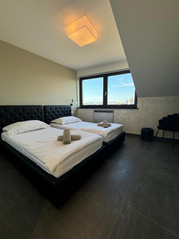Posteľ alebo postele v izbe v ubytovaní Seaview