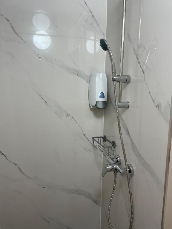 Koupelna v ubytování HOTEL THANIA