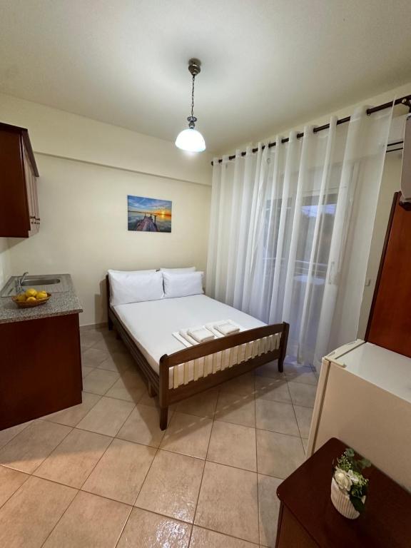 Postel nebo postele na pokoji v ubytování Nevi Rooms