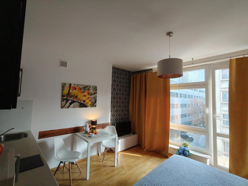 Posedenie v ubytovaní City Center Studio Apartments