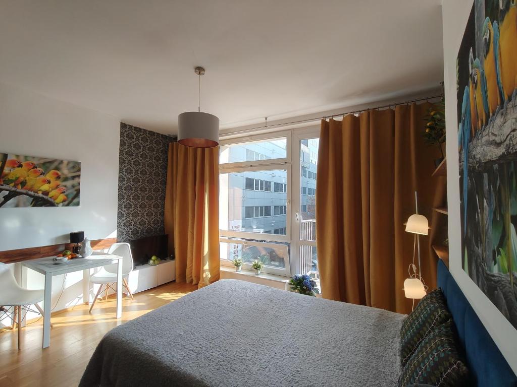Posteľ alebo postele v izbe v ubytovaní City Center Studio Apartments