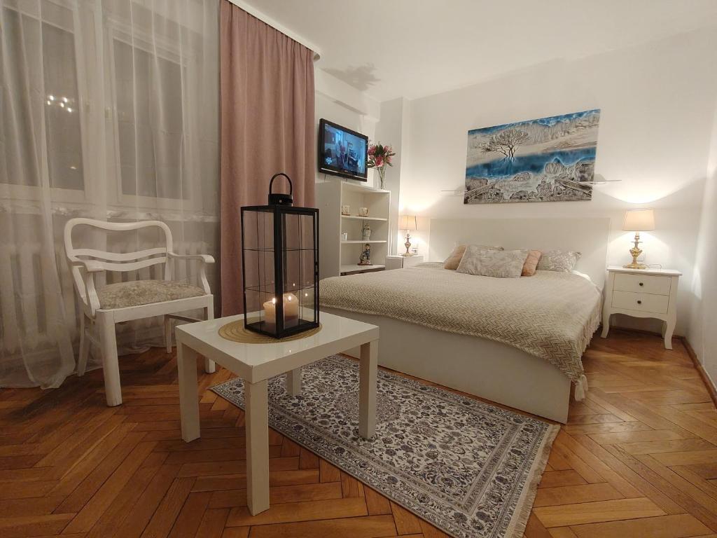 Posteľ alebo postele v izbe v ubytovaní City Center Studio Apartments