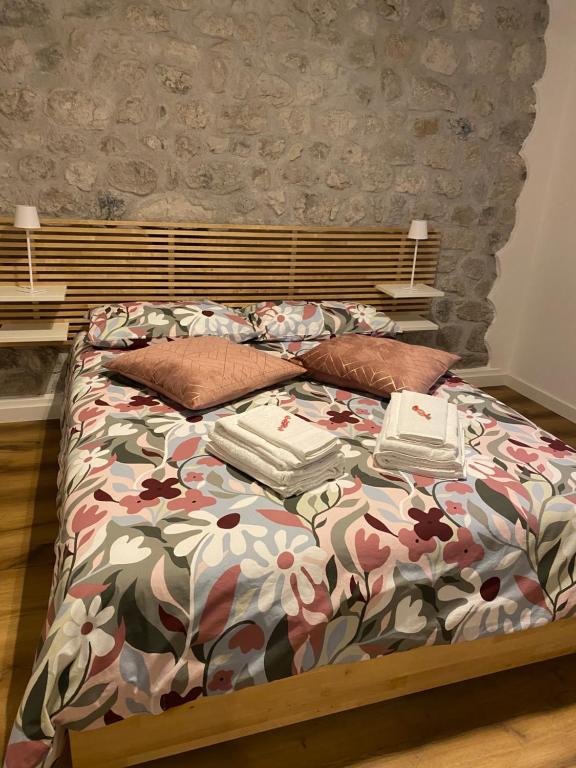 Postel nebo postele na pokoji v ubytování Appartamento Scaligeri