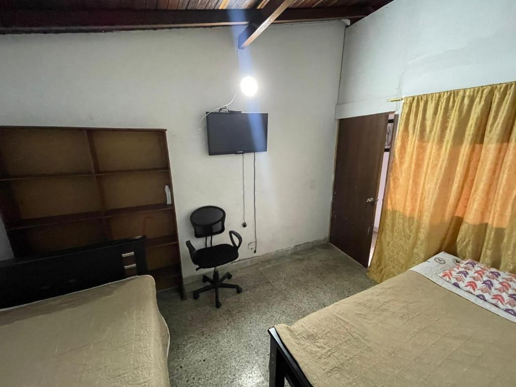 TV a/nebo společenská místnost v ubytování Hostel Urban City Medellin