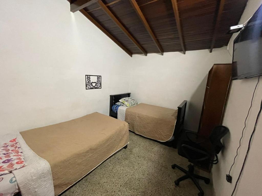 TV a/nebo společenská místnost v ubytování Hostel Urban City Medellin
