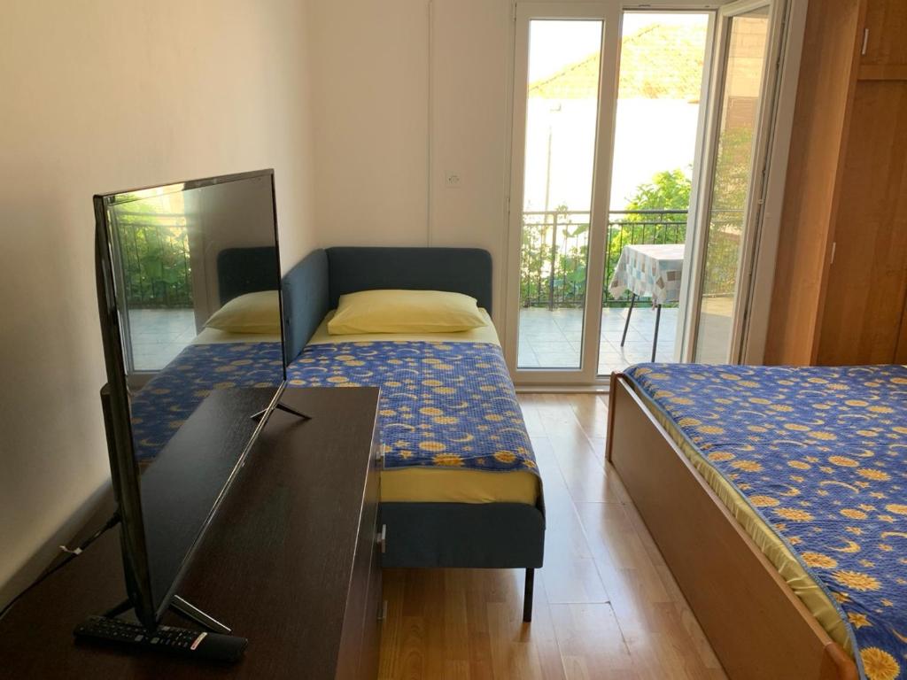 Posteľ alebo postele v izbe v ubytovaní Marko Apartment