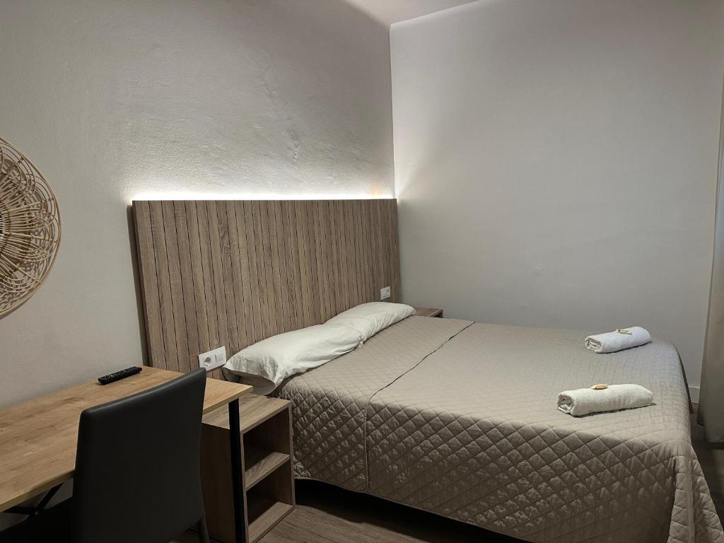 Postel nebo postele na pokoji v ubytování Can Setmanes by CozyCatalonia