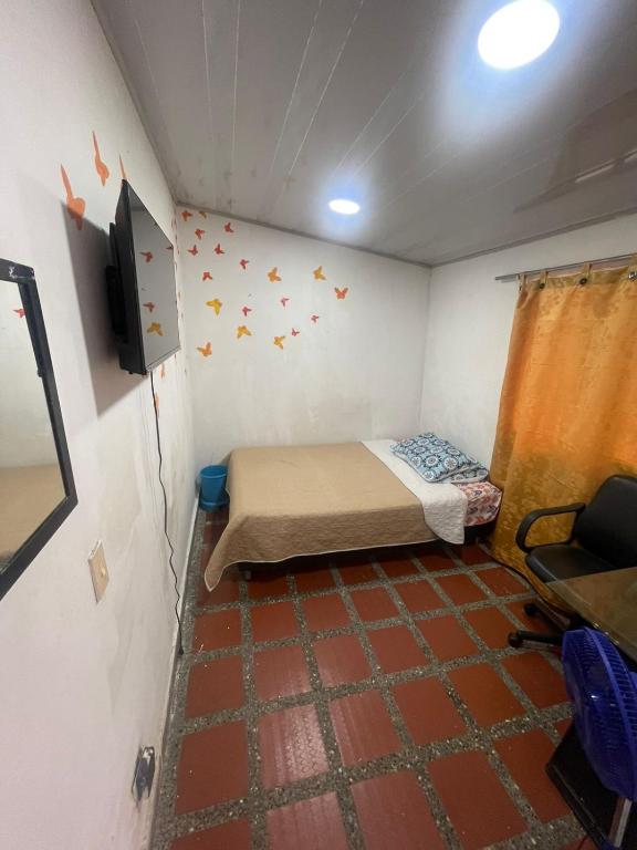 TV a/nebo společenská místnost v ubytování Hostel Urban City Medellin