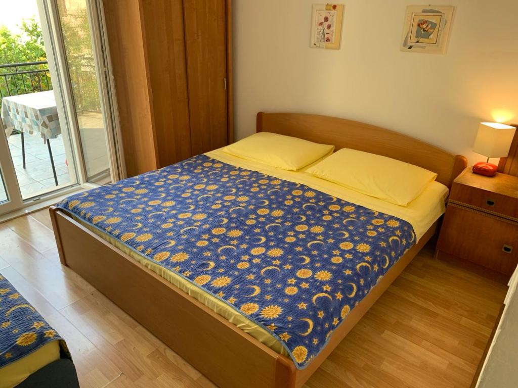 Posteľ alebo postele v izbe v ubytovaní Marko Apartment