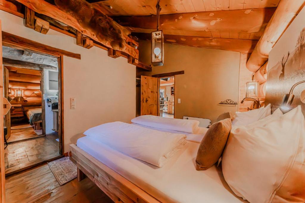 Postel nebo postele na pokoji v ubytování Chalet Vogelkirsche