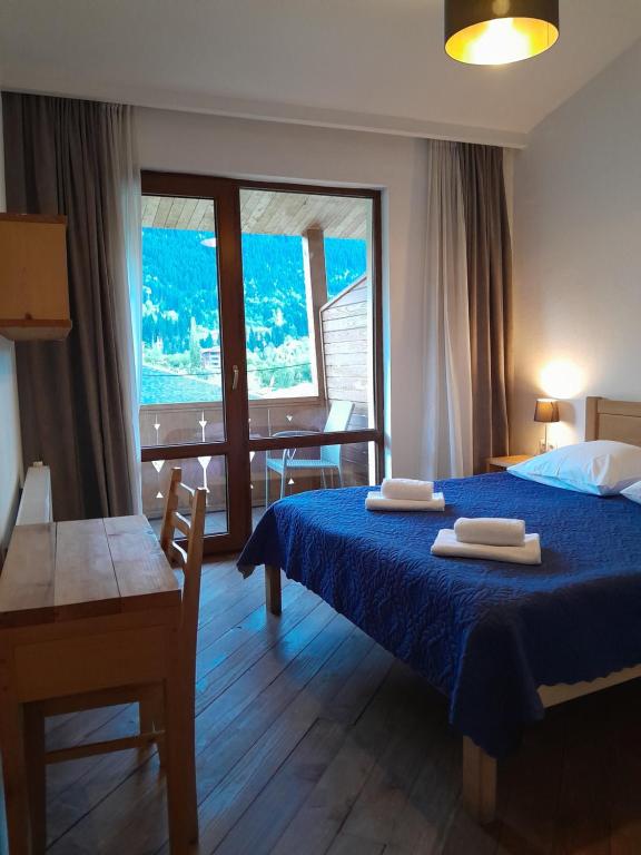 Postel nebo postele na pokoji v ubytování Bapsha Guesthouse