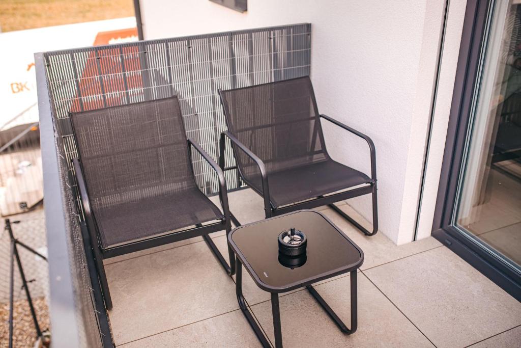 Posezení v ubytování Apartmány DVĚ BOBULE 1 kk