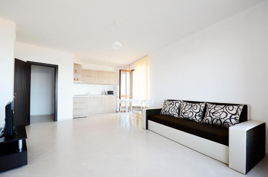 Kuchyň nebo kuchyňský kout v ubytování Sunrise Apartments