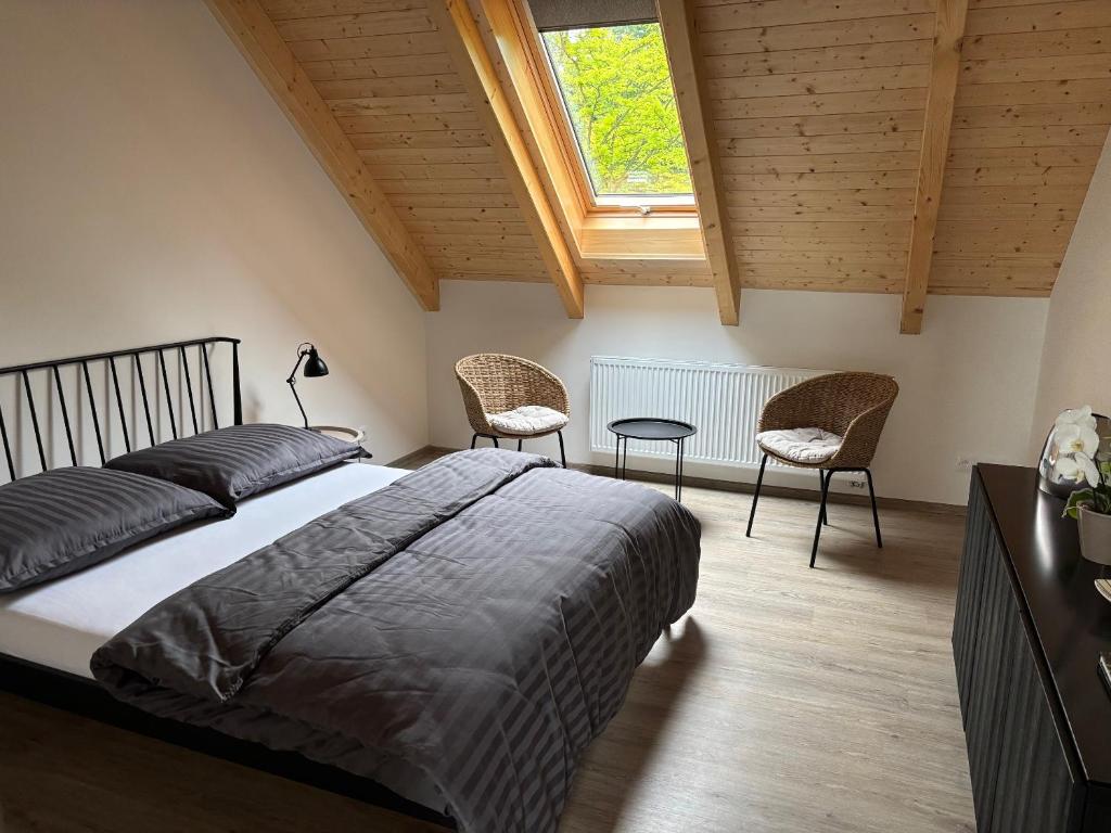 Postel nebo postele na pokoji v ubytování Apartmány Hrachov