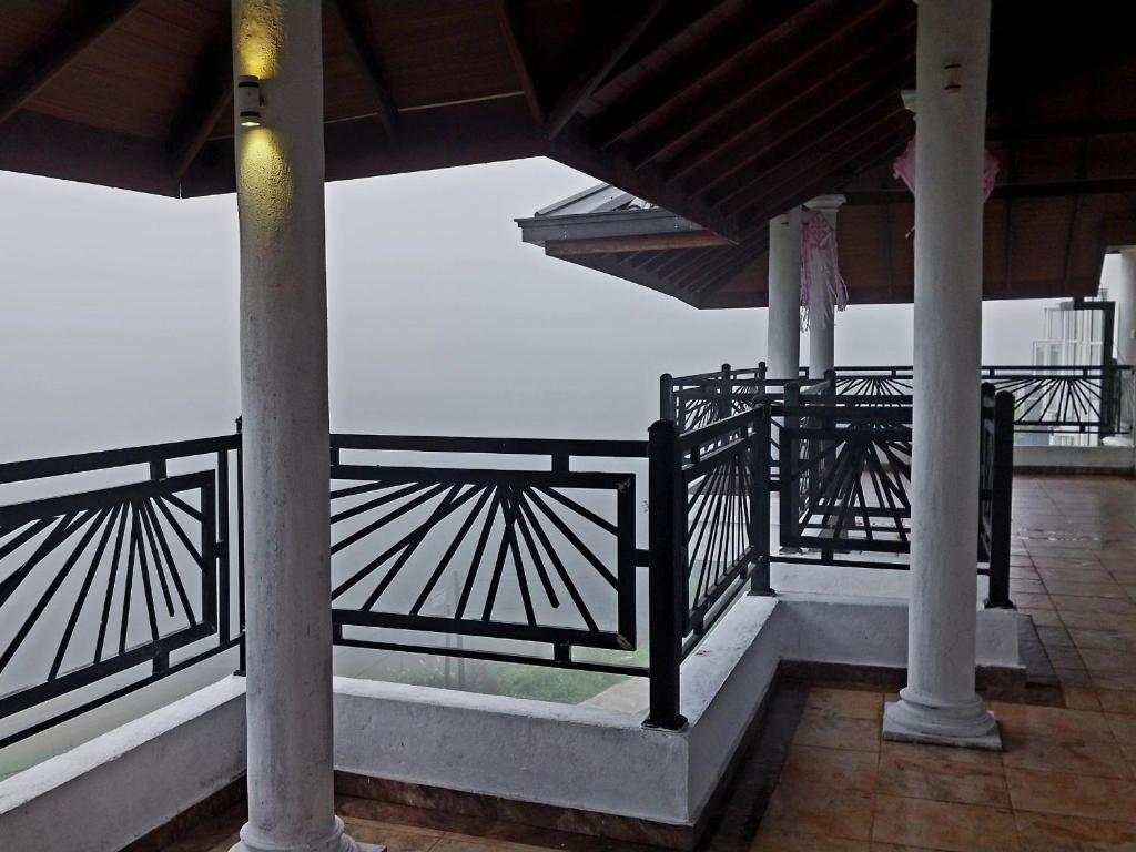 Balkón nebo terasa v ubytování Drizzle Ridge Hotel