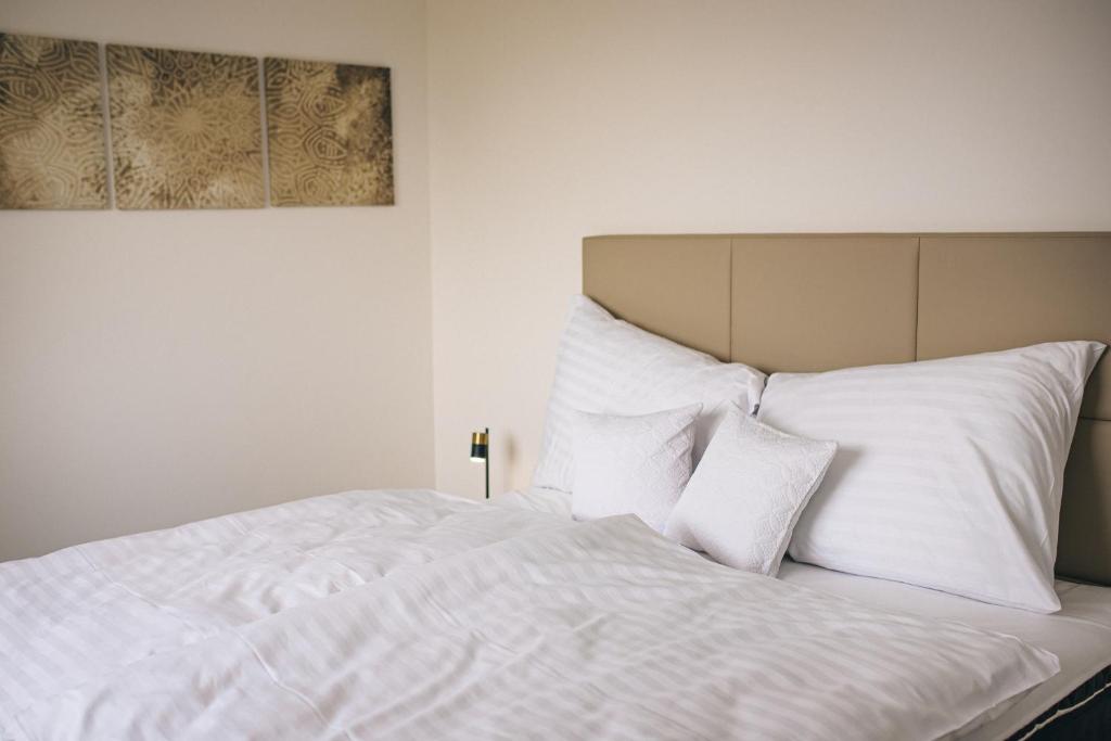 Postel nebo postele na pokoji v ubytování Apartmány DVĚ BOBULE 2KK