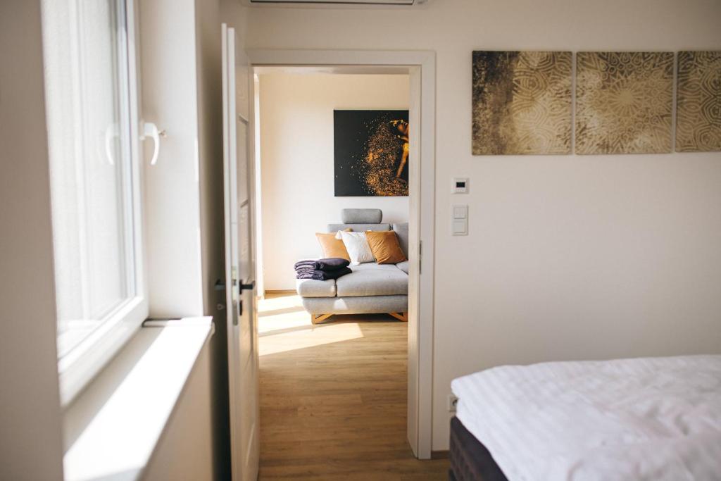 Postel nebo postele na pokoji v ubytování Apartmány DVĚ BOBULE 2KK
