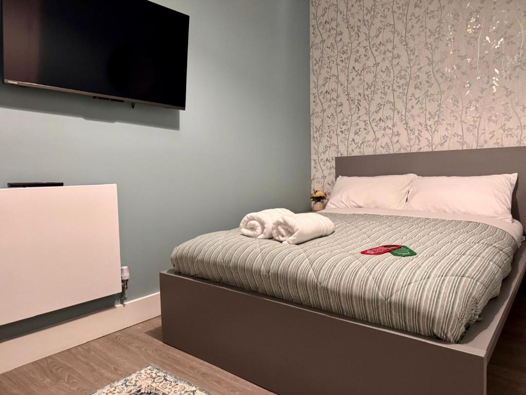 Postel nebo postele na pokoji v ubytování 40th Avenue Guest House