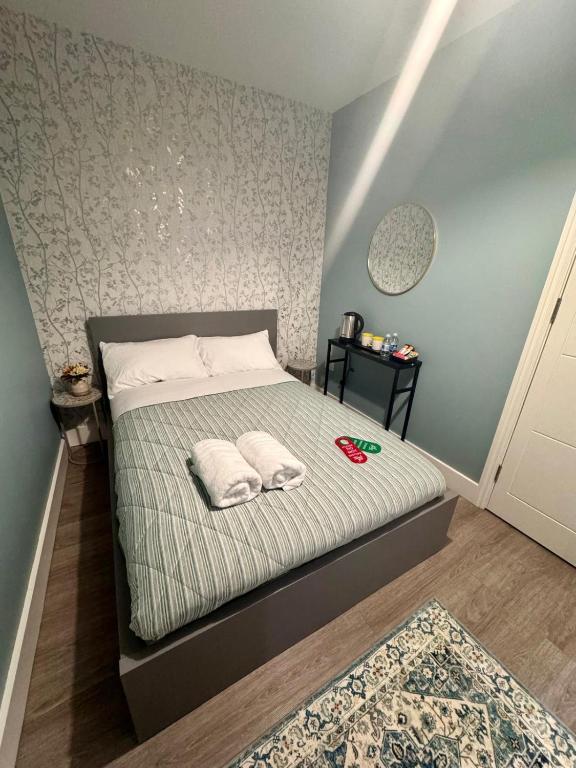 Postel nebo postele na pokoji v ubytování 40th Avenue Guest House