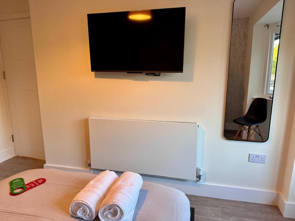 TV a/nebo společenská místnost v ubytování 40th Avenue Guest House