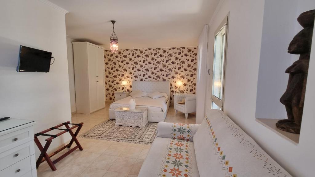 TV a/nebo společenská místnost v ubytování Residence Maresol