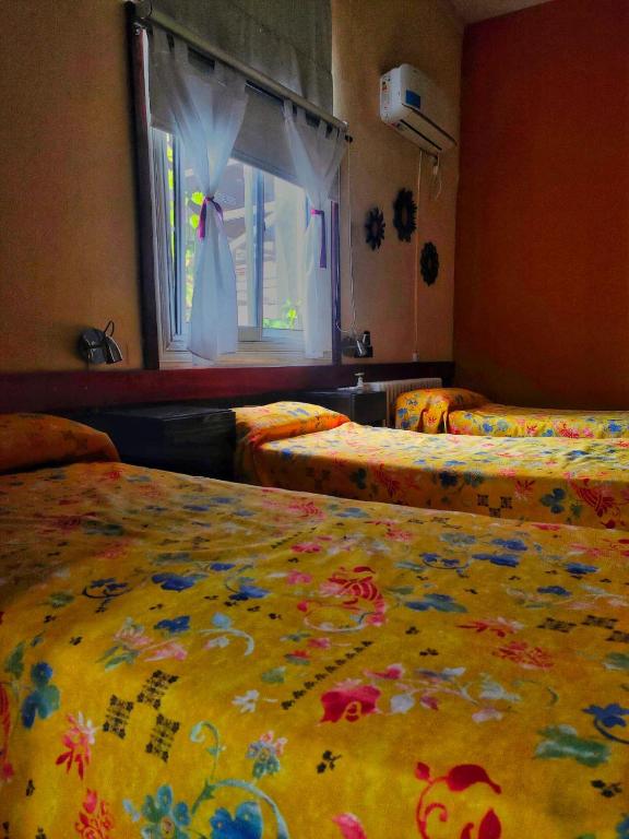 Postel nebo postele na pokoji v ubytování Posada del Arbol