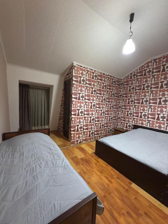 Postel nebo postele na pokoji v ubytování emily