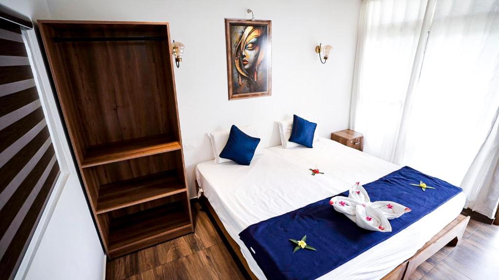 Postel nebo postele na pokoji v ubytování Lake view Resort cherai