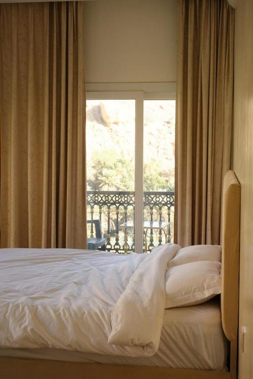 Voodi või voodid majutusasutuse Rest House Wadi Bani Khalid toas