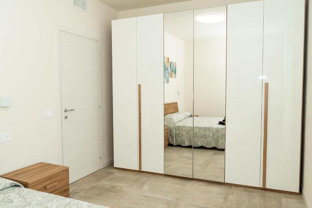 Postel nebo postele na pokoji v ubytování Andrea Lake room
