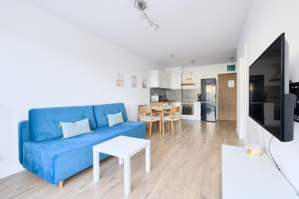 Η κουζίνα ή μικρή κουζίνα στο ApartamentyPrzyMorzu Bałtycki z miejscem postojowym i ogródkiem