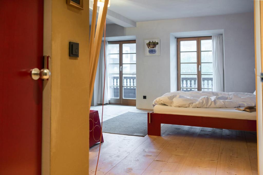 Ένα ή περισσότερα κρεβάτια σε δωμάτιο στο berge Ferien Apartments