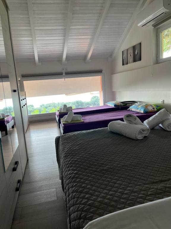 Postel nebo postele na pokoji v ubytování Mannou House