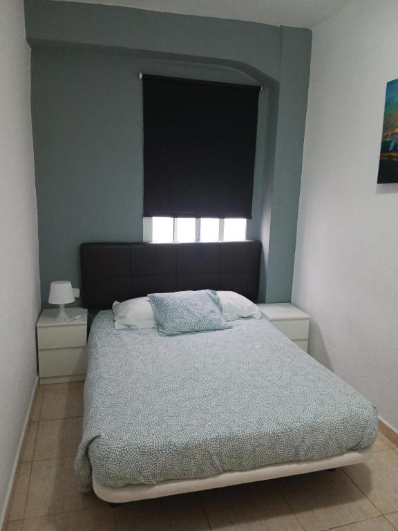 Postel nebo postele na pokoji v ubytování Apartamento Ciudad de las Ciencias 2