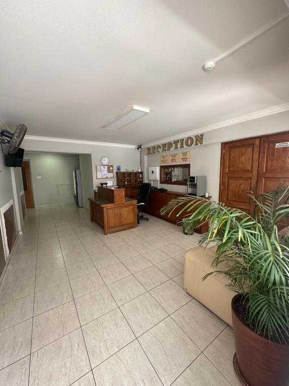 Kuchyň nebo kuchyňský kout v ubytování Ellis Hotel Apartments