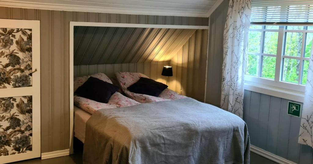 Postel nebo postele na pokoji v ubytování VILLA HASSELBAKKEN