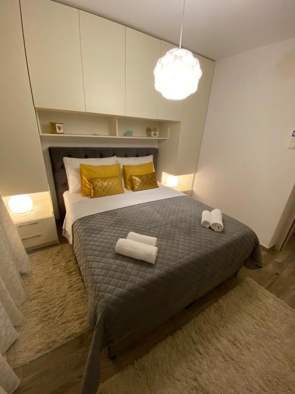 Posteľ alebo postele v izbe v ubytovaní Villa Pergola-Apartment Toni
