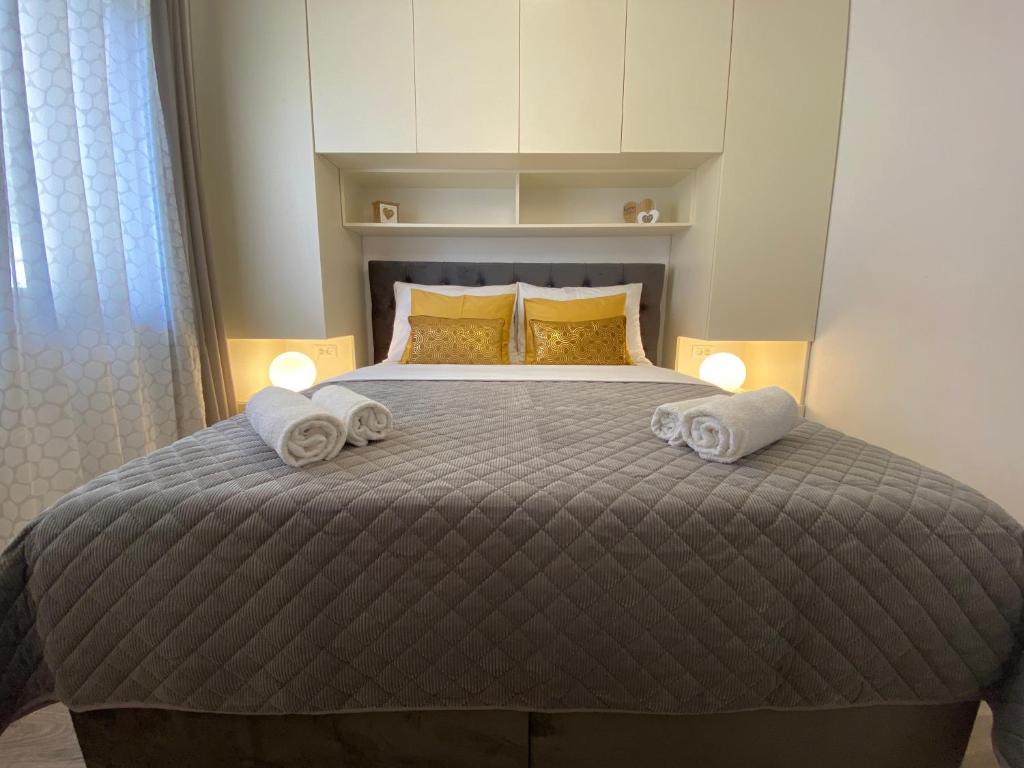 Posteľ alebo postele v izbe v ubytovaní Villa Pergola-Apartment Toni