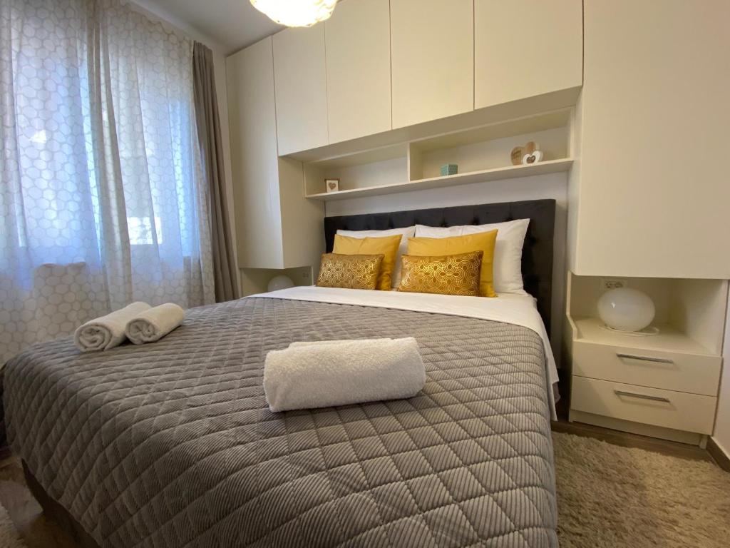 Posteľ alebo postele v izbe v ubytovaní Villa Pergola-Apartment Toni