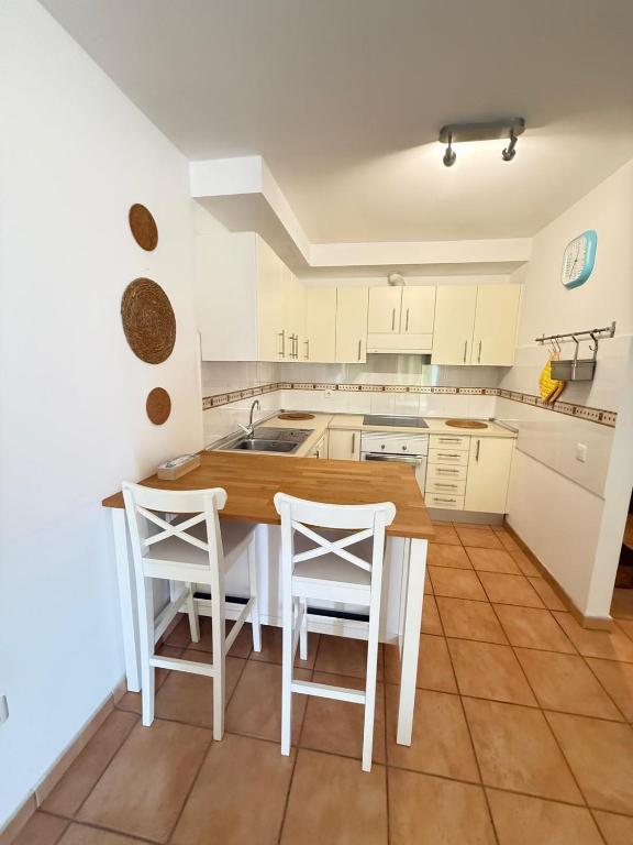 Kuchyň nebo kuchyňský kout v ubytování Corralejo Suite
