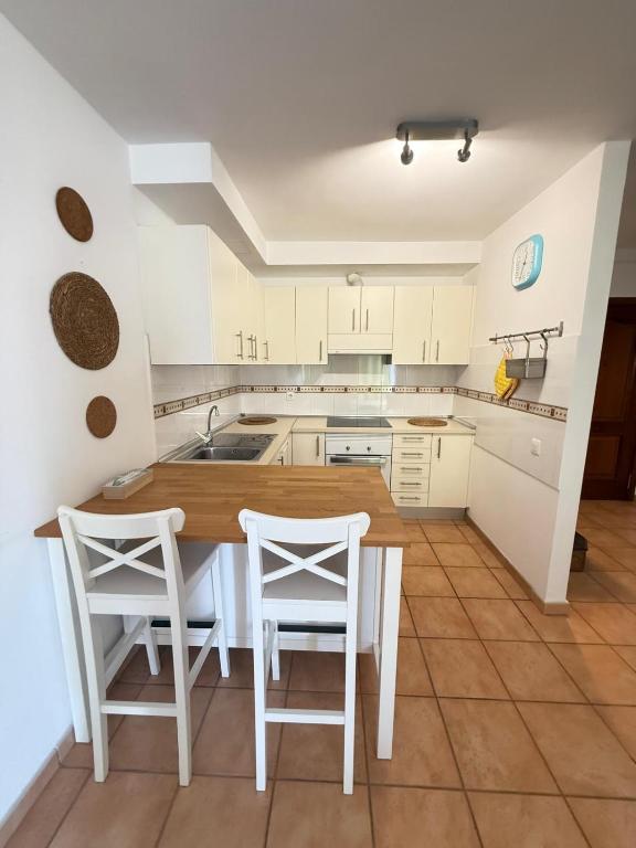 Kuchyň nebo kuchyňský kout v ubytování Corralejo Suite