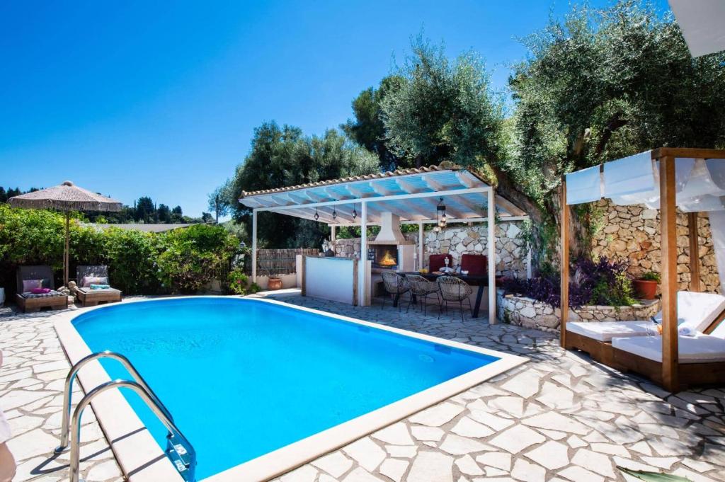 an image of a swimming pool in a villa at Villa Olga Katouna by Villa Plus in Katouna