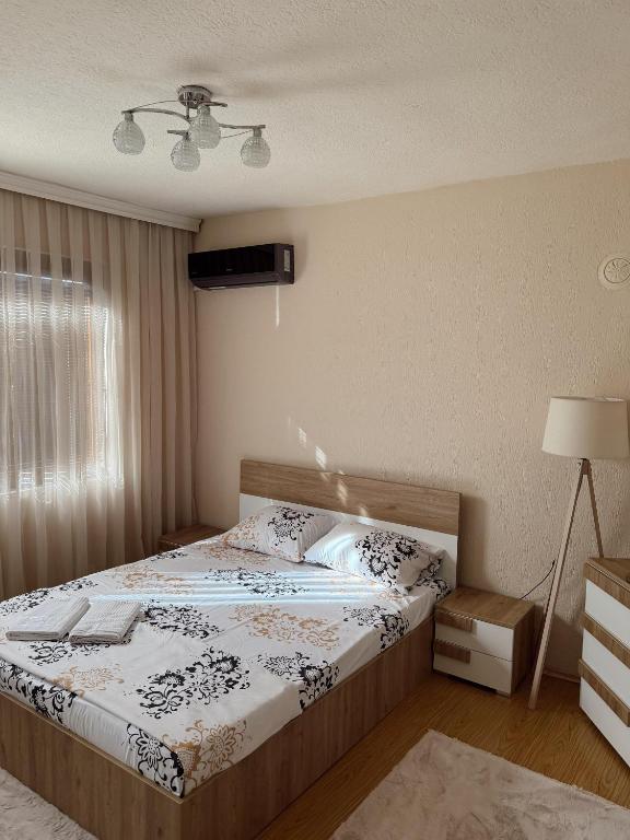 Postel nebo postele na pokoji v ubytování Corner Apartments