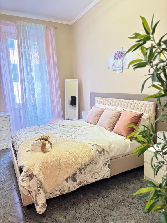 A bed or beds in a room at Casa Camilla