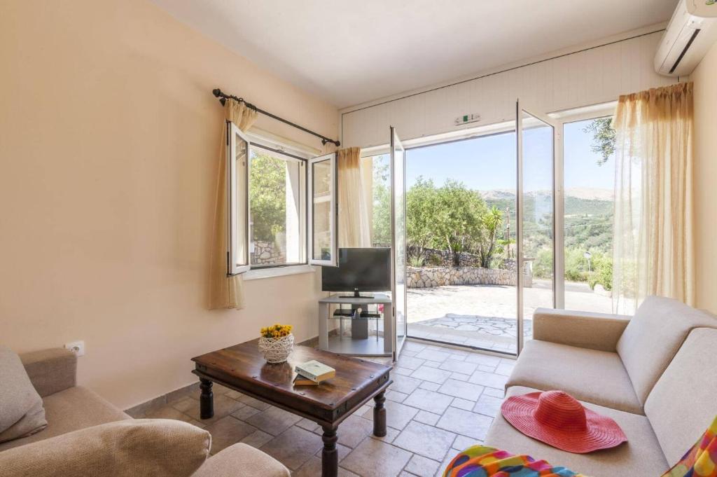 A seating area at Villa Petrosa by Villa Plus