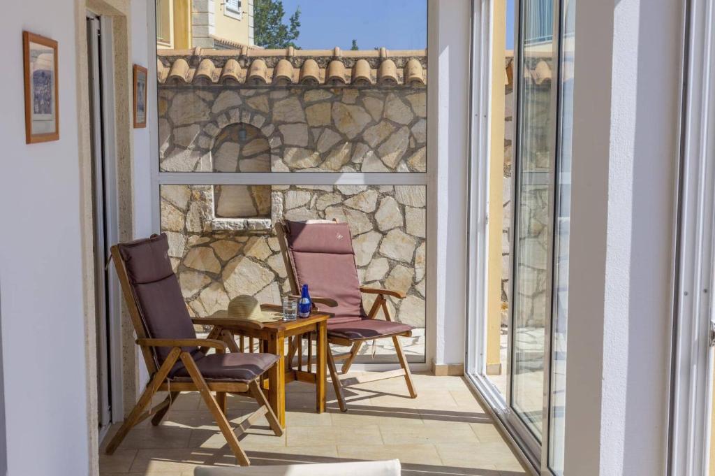 A balcony or terrace at Villa Petrosa by Villa Plus