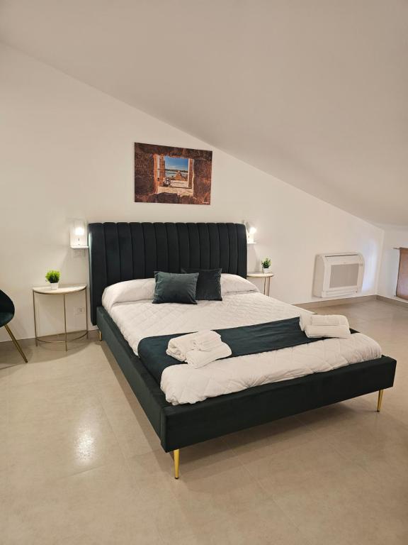 Postel nebo postele na pokoji v ubytování Aura B&B